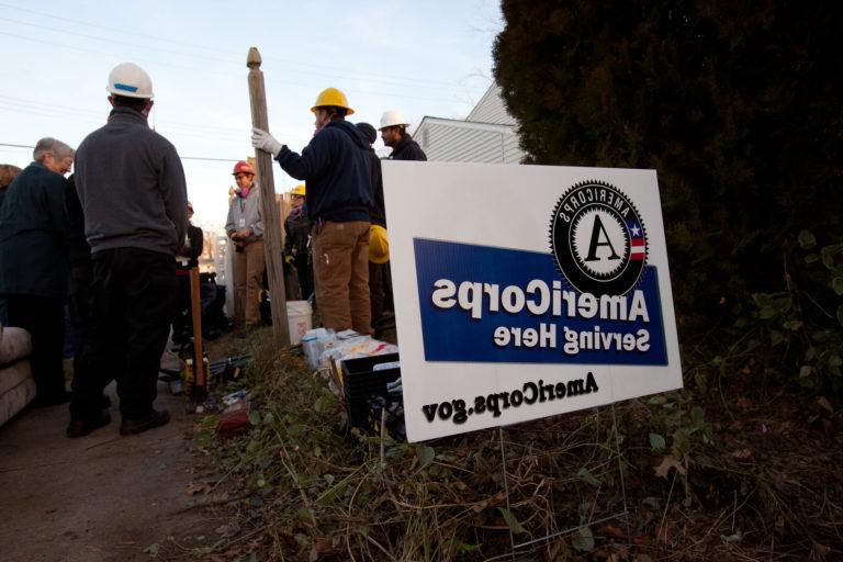 AmeriCorps Serving Here sign
